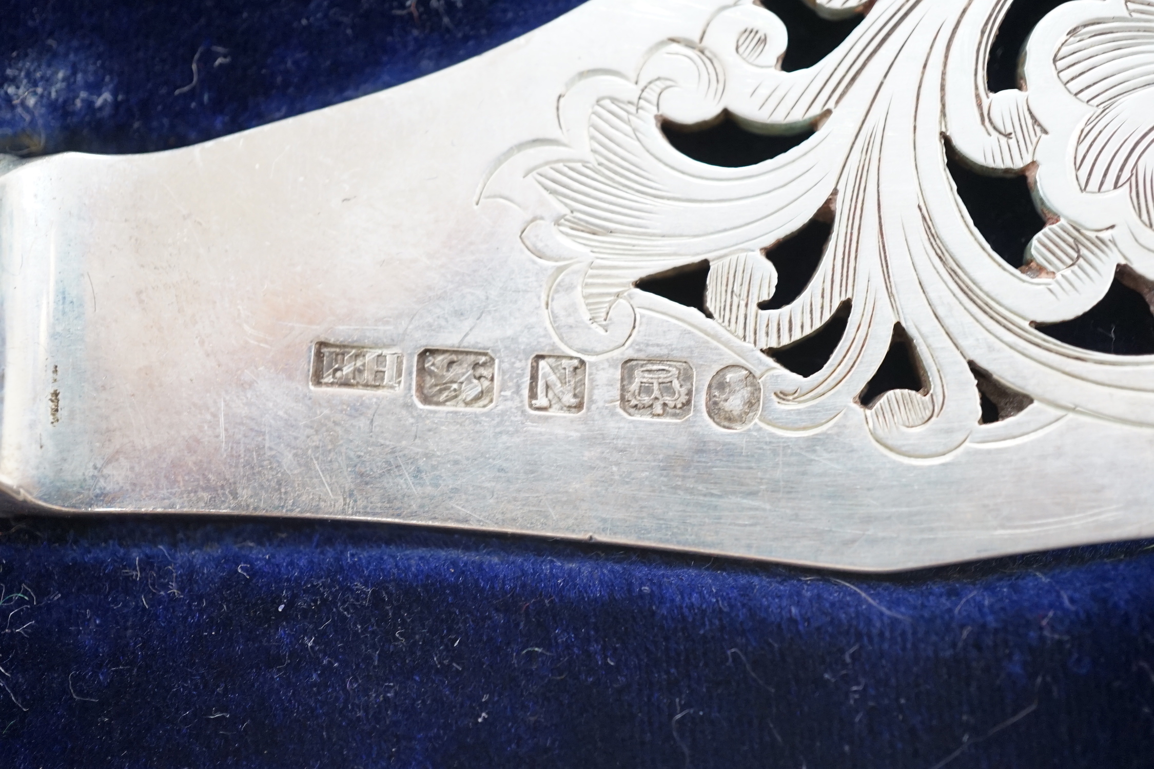 A cased pair of Victorian silver fish servers, Henry Howson, Sheffield, 1856, knife 33.8cm.